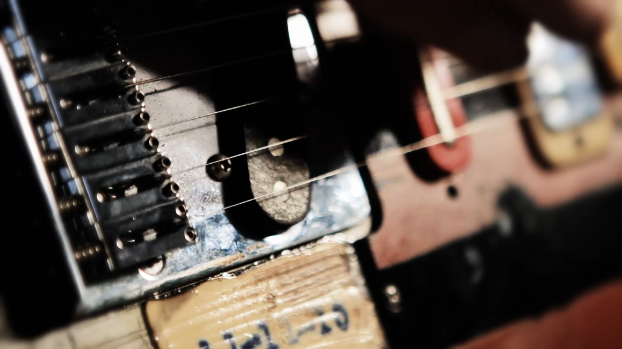 Close up of old guitar