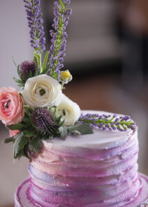 Close up of pink cake with flower