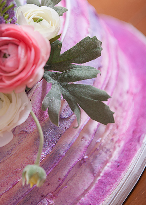Close up of pink cake with flower