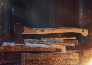Rustic product photography of axe and wood with fire